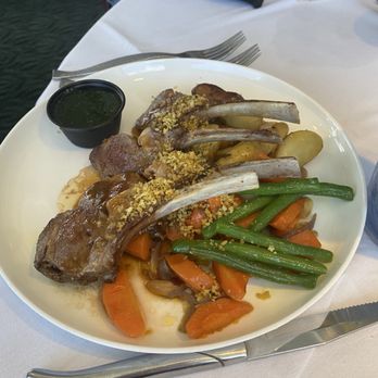 Bon Appetit - Full Rack of Lamb! Delicious. The mint sauce is divine! - New American Near Me - Dunedin, Florida Bon Appetit - Full Rack of Lamb! Delicious. The mint sauce is divine! - New American Near Me - Dunedin, Florida