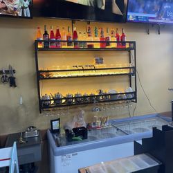 786 Kebab & Curry - The right wall facing the cash register