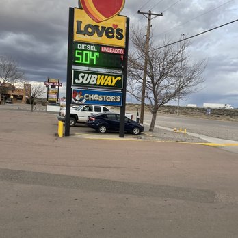 Love's Travel Stop - a car parked in front of a love's sign - Convenience Stores Near Me - Gallup, New Mexico