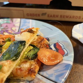 Donatos Pizza - a slice of pizza on a plate - Pizza Near Me - Florence, Kentucky Donatos Pizza - a slice of pizza on a plate - Pizza Near Me - Florence, Kentucky