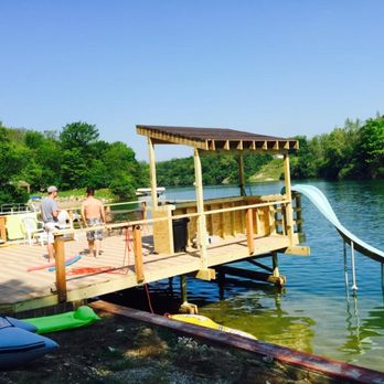 Kenneth Allen Company - a dock with a water slide - General Contractors Near Me - St Charles, Illinois Kenneth Allen Company - a dock with a water slide - General Contractors Near Me - St Charles, Illinois