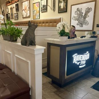 The Ravenous Pig - Hostess stand next to the parking lot entrance (for reservation seating only). - New American Near Me - Winter Park, Florida The Ravenous Pig - Hostess stand next to the parking lot entrance (for reservation seating only). - New American Near Me - Winter Park, Florida