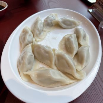 Dumpling Xi - Beef and onion steamed dumplings - Chinese Near Me - New York, New York