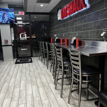 Fat Shack - Barstool seating, dining area - Sandwiches Near Me - Webster, Texas