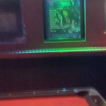 Sugars Bar - a neon lit poster on the wall - Sports Bars Near Me - Garden Grove, California Sugars Bar - a neon lit poster on the wall - Sports Bars Near Me - Garden Grove, California