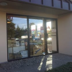 Bel-Kirk Stamp Coin & Comics - Parking Lot Store Front
