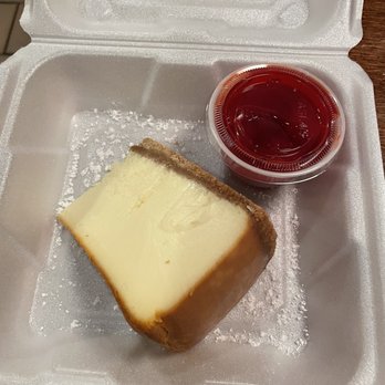Provino's Italian Restaurant - Cheesecake and strawberry sauce to go. - Italian Near Me - Cumming, Georgia
