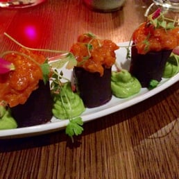Crudo mar : salmon, rocoto pepper, blue potato, achiote oil and crazy pea