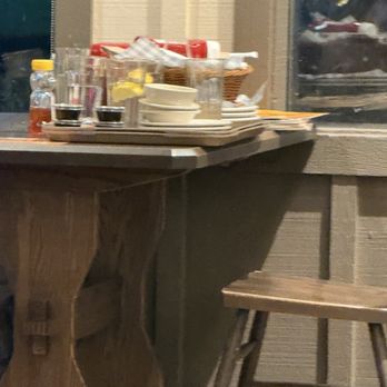 Cracker Barrel Old Country Store - Dirty dishes that sat there during our meal - American Near Me - Kissimmee, Florida