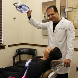 Rubal Dentistry - Dr. Frank Rubal talking to patient