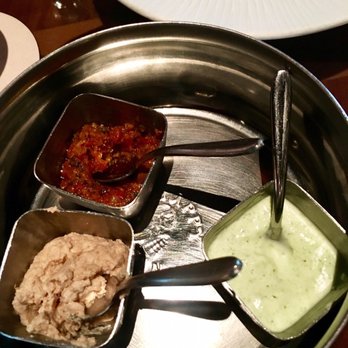 Tiffins Restaurant - Pomegranate Olive Oil, Harissa Yogurt, Zhough Yogurt, Black-Eyed Pea Hummus - New American Near Me - Lake Buena Vista, Florida Tiffins Restaurant - Pomegranate Olive Oil, Harissa Yogurt, Zhough Yogurt, Black-Eyed Pea Hummus - New American Near Me - Lake Buena Vista, Florida