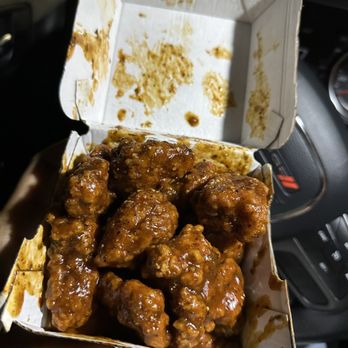 Buffalo Wild Wings - 10 Boneless Wings Caribbean jerk, mixed with lemon pepper - Chicken Wings Near Me - Webster, Texas
