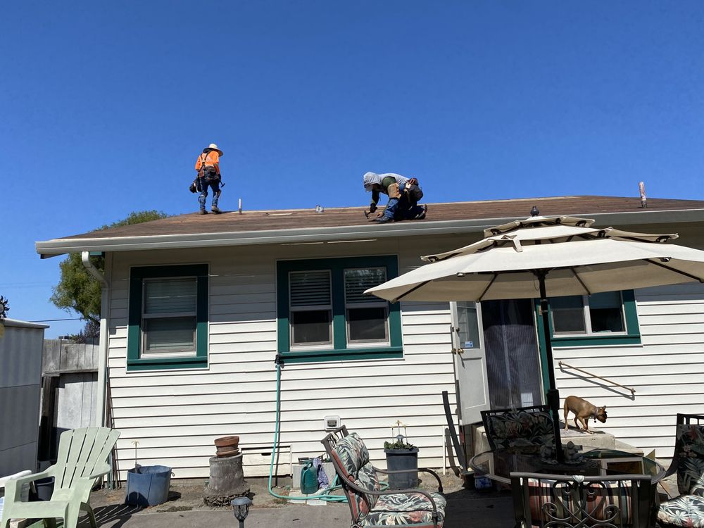 Slide of Urrutia Roofing