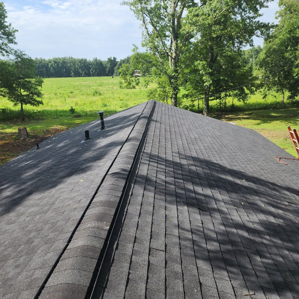 Slide of Flournoy and Sons Roofing