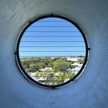 Key West Lighthouse & Keeper's Quarters Museum - View from the steps inside the lighthouse. - Museums Near Me - Key West, Florida Key West Lighthouse & Keeper's Quarters Museum - View from the steps inside the lighthouse. - Museums Near Me - Key West, Florida