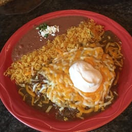 Beef enchiladas. Swimming in sauce. Beef enchiladas. Swimming in sauce.