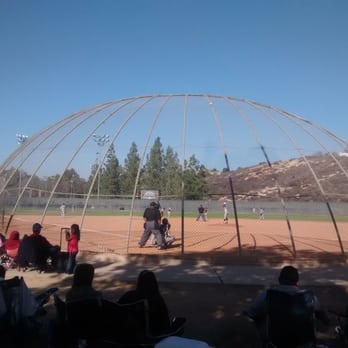 The Yard - Softball backstops for baseball games doesn't keep the balls from flying out of the field and hitting nearby cars. - Batting Cages Near Me - Fullerton, California The Yard - Softball backstops for baseball games doesn't keep the balls from flying out of the field and hitting nearby cars. - Batting Cages Near Me - Fullerton, California