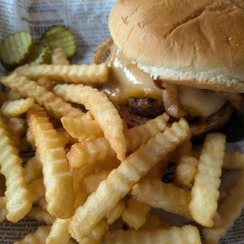 Moonlite Bay - The Brisk Burger with french fries. The golden sauce is a dark yellow mustard and the bacon is fried to medium. - American Near Me - Crosslake, Minnesota