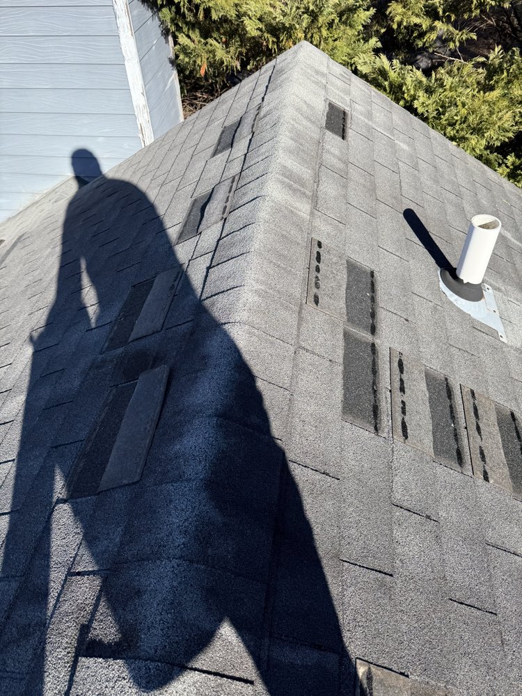 Slide of Umana Roofing