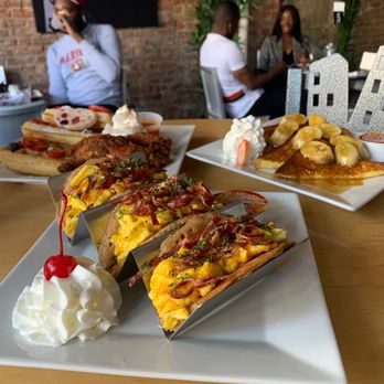 Nostrand Station Bar & Lounge - Bacon Egg & Cheese Pancake Taco, Chicken & Waffles, Banana Foster French Toast - Bars Near Me - Brooklyn, New York Nostrand Station Bar & Lounge - Bacon Egg & Cheese Pancake Taco, Chicken & Waffles, Banana Foster French Toast - Bars Near Me - Brooklyn, New York