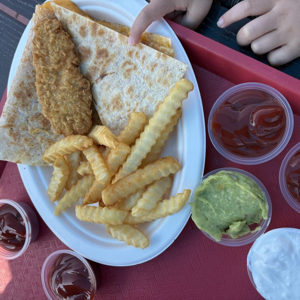 Our kids shared quesadilla and chicken strips with fries. Quesadilla was great! Our kids shared quesadilla and chicken strips with fries. Quesadilla was great!