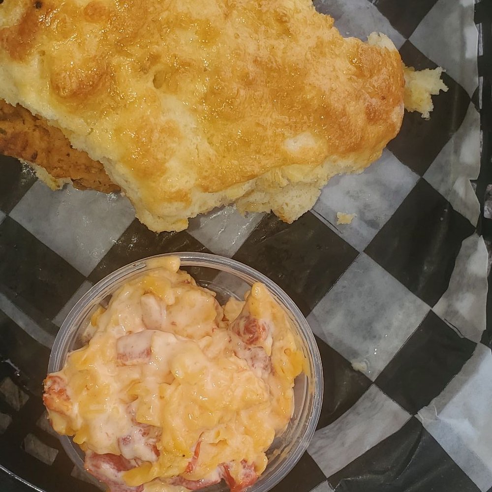 The Hammond's Ferry Larder - i placed the side of pimento cheese next to the biscuit as a reference of size. it is a standard dipping sauce cup. - Sandwiches Near Me - North Augusta, South Carolina