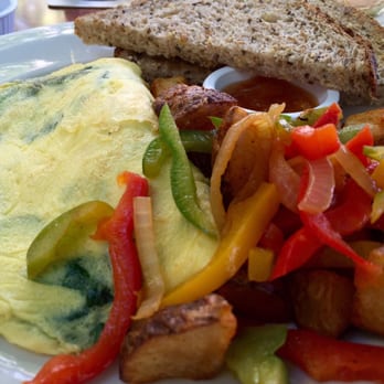 Sarabeth's Key West - Spinach and Goat Cheese Omelette. - American Near Me - Key West, Florida Sarabeth's Key West - Spinach and Goat Cheese Omelette. - American Near Me - Key West, Florida
