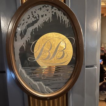 Blue Bayou Restaurant - From door with emblem - Cajun/Creole Near Me - Anaheim, California Blue Bayou Restaurant - From door with emblem - Cajun/Creole Near Me - Anaheim, California