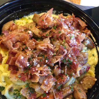 Pasta di Guy - Spaghetti with Creamy Pesto, bacon, and sausage - Italian Near Me - Wesley Chapel, Florida Pasta di Guy - Spaghetti with Creamy Pesto, bacon, and sausage - Italian Near Me - Wesley Chapel, Florida