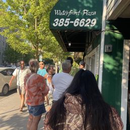 Waiting in line for pizza with only 40 minutes until closing. Waiting in line for pizza with only 40 minutes until closing.