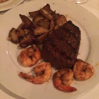 Ruffino's - 12 oz filet mignon with roasted potatoes and topped with grilled shrimp - Italian Near Me - Baton Rouge, Louisiana