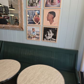 Le Marais Bakery - Closer view of the seating area near the corner I'd like the artwork on the walls - Bakeries Near Me - San Francisco, California