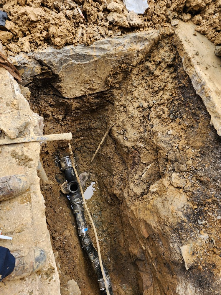 Slide of Trademark Plumbing and Heating