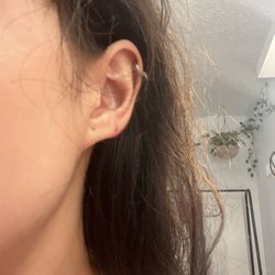 Xtreme Tattoos & Piercings - So low on my lobe. Looks like it could've torn through my whole lobe if someone pulled my earring. disappointed.
