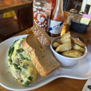 Two Chicks Cafe - Omelette with Gruyere cheese - Breakfast & Brunch Near Me - New Orleans, Louisiana Two Chicks Cafe - Omelette with Gruyere cheese - Breakfast & Brunch Near Me - New Orleans, Louisiana