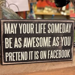 a sign that says may your life someday be as awesome as you pretend its on facebook