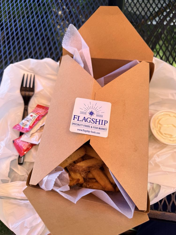 Flagship Specialty Foods & Fish Market Logo