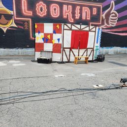 Parking lot set up for All's Faire, the play they put on outdoors in end of summer 2021 Parking lot set up for All's Faire, the play they put on outdoors in end of summer 2021