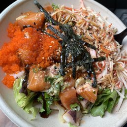 Salmon, octopus, crab salad, masago, sushi rice, spring mix, furikake and nori with spicy mayo and poke sauce! Sooooooo good! Salmon, octopus, crab salad, masago, sushi rice, spring mix, furikake and nori with spicy mayo and poke sauce! Sooooooo good!