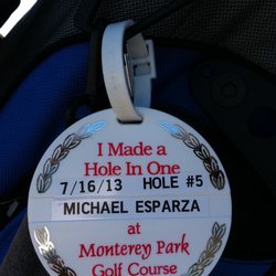 Kevin P Norwall, PGA - My son Michael hitting a hole in one with Kevin.