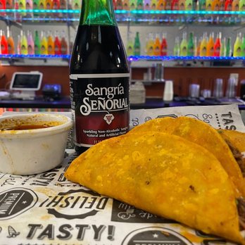 El Texano Bar and Grill - a bottle of beer and three tacos - Mexican Near Me - Alexandria, Virginia El Texano Bar and Grill - a bottle of beer and three tacos - Mexican Near Me - Alexandria, Virginia