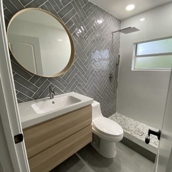 Juankys Handyman Services - New Bathroom: tile work throughout (floor, walls shower floor), new plumbing, vanity Installation, new toilet, new light fixtures, etc - Handyman Near Me