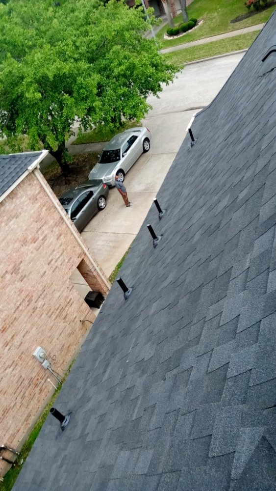 Slide of Refined Roofing & Construction