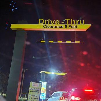 McDonald's - a drive thru sign at night - Fast Food Near Me - Syracuse, New York McDonald's - a drive thru sign at night - Fast Food Near Me - Syracuse, New York