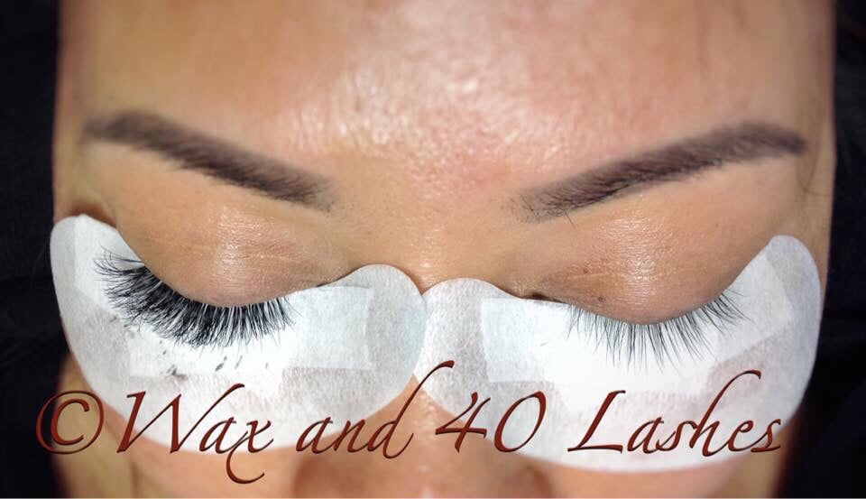 Wax and 40 Lashes Logo