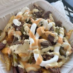 Racks R Us Ribs - Loaded fries (originally comes with onion, but I asked for none)