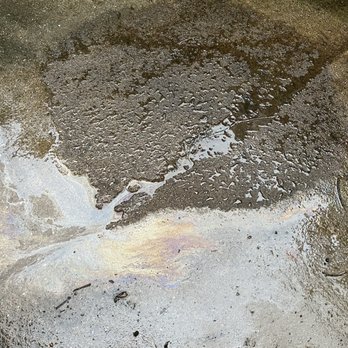 Autoworld Kia - Oil stain -- I thought it was dirt so tried to hose it down. Water and oil obviously don't mix so clearly this is an oil stain. - Auto Repair Near Me - East Meadow, New York