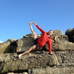 Koru Way - Yoga pose on a rock.