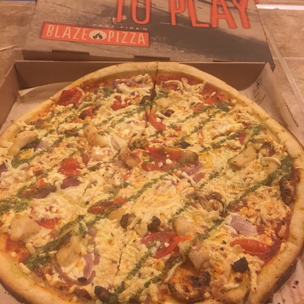 Blaze Pizza - GF crust, red sauce, vegan cheese, goat cheese, roasted garlic, red onions, chicken, & cherry tomatoes: $12.12. DELICIOUS!!!! - Salad Near Me - Gold River, California Blaze Pizza - GF crust, red sauce, vegan cheese, goat cheese, roasted garlic, red onions, chicken, & cherry tomatoes: $12.12. DELICIOUS!!!! - Salad Near Me - Gold River, California
