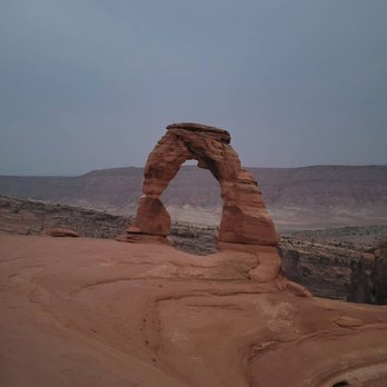 Delicate Arch - At dusk & smoky. - Hiking Near Me - Moab, Utah